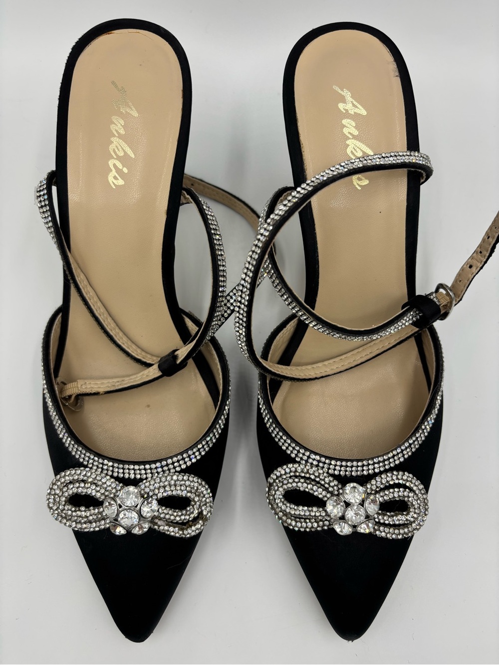 Embellished Black Pointed-Toe Slingback Heels with Crystal Bow